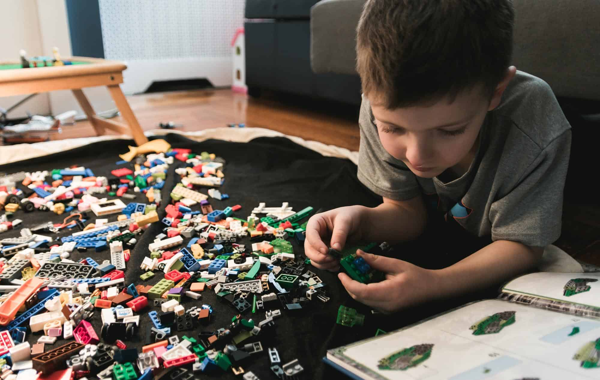 The Superhero Projekt_Superhero image_Lindsey Hughson_Executive Mentor_Kid playing with Lego set